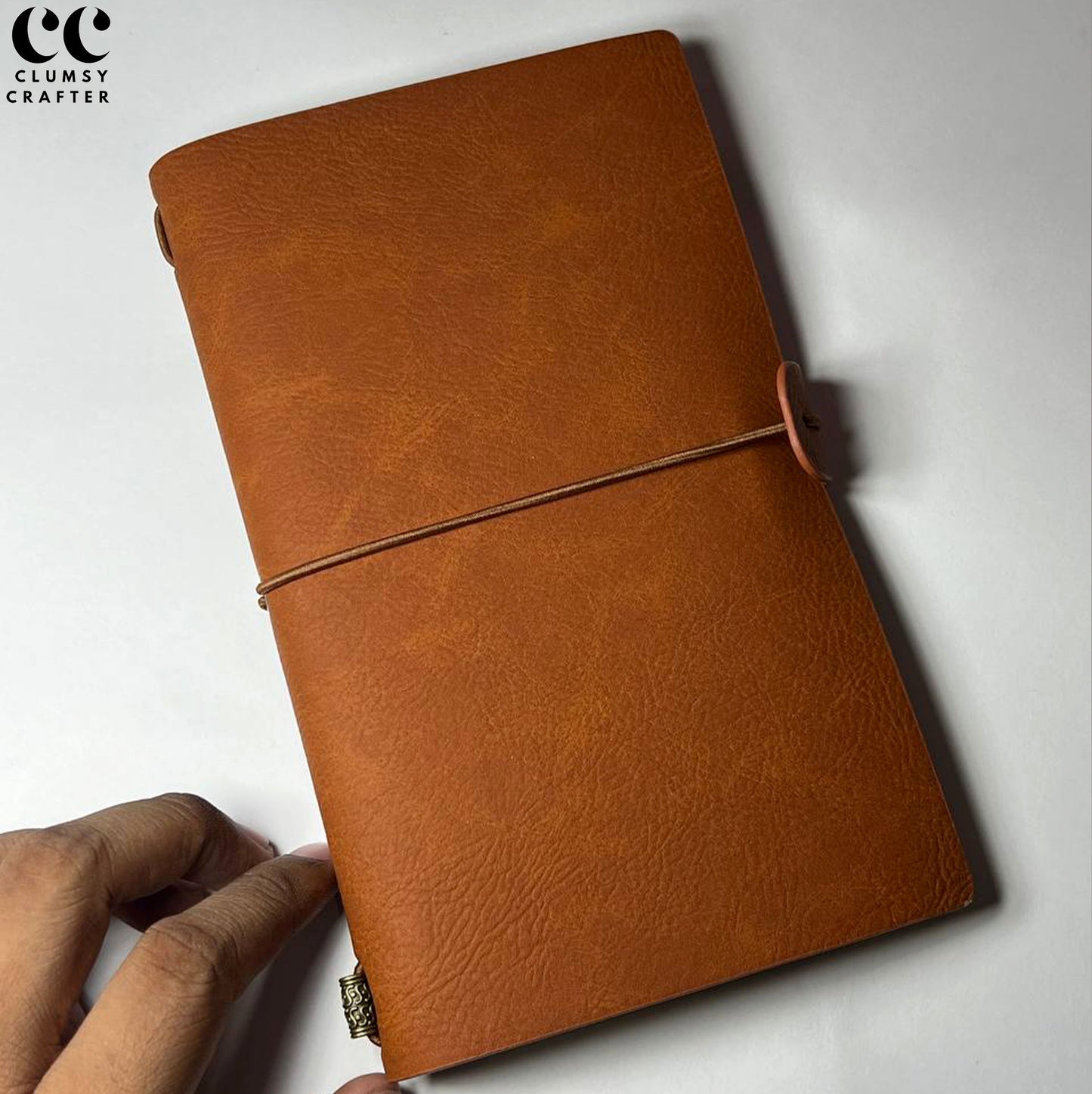 13.3 LEATHER NOTEBOOK- STRAP CLOSURE