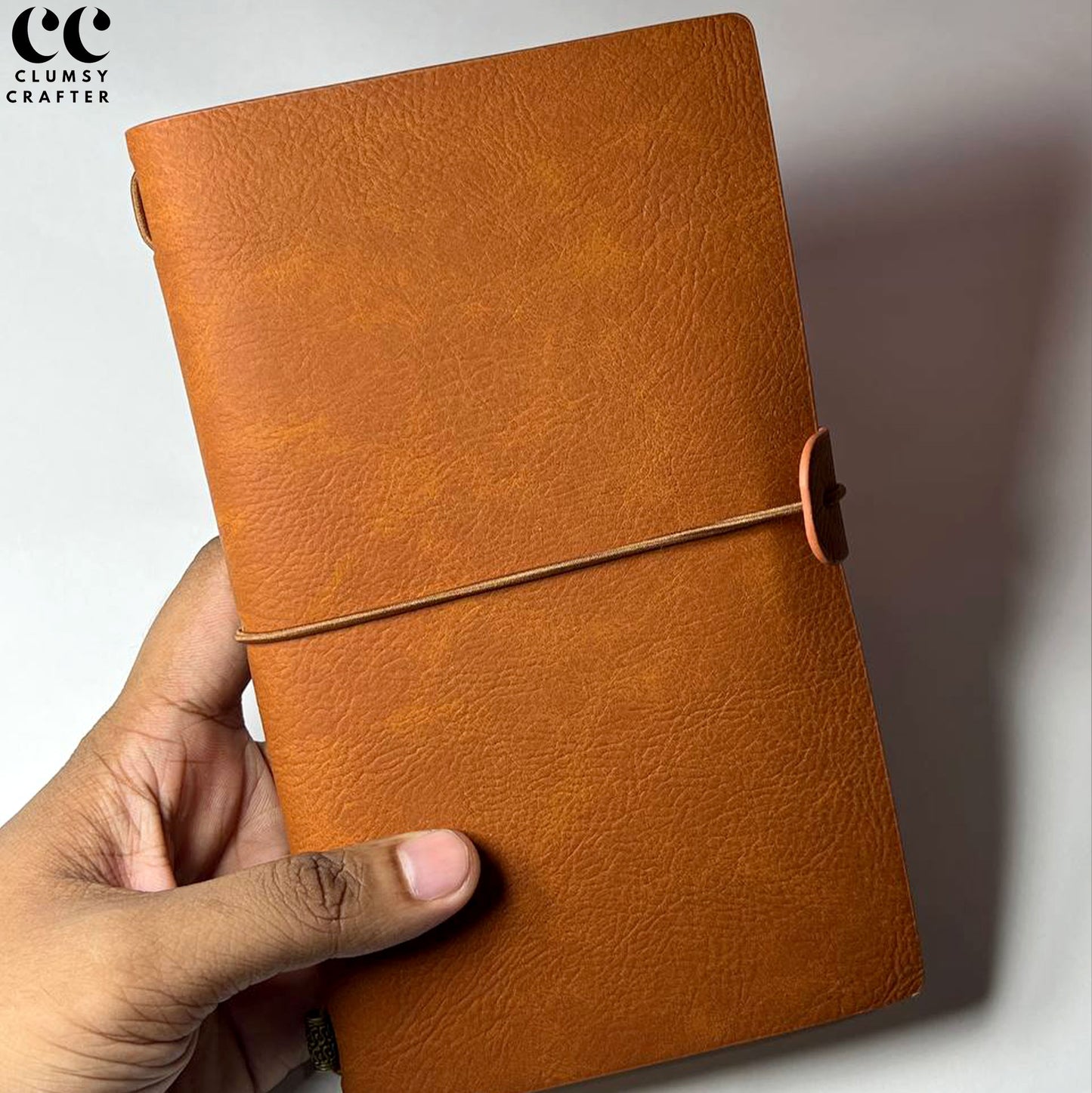 13.3 LEATHER NOTEBOOK- STRAP CLOSURE