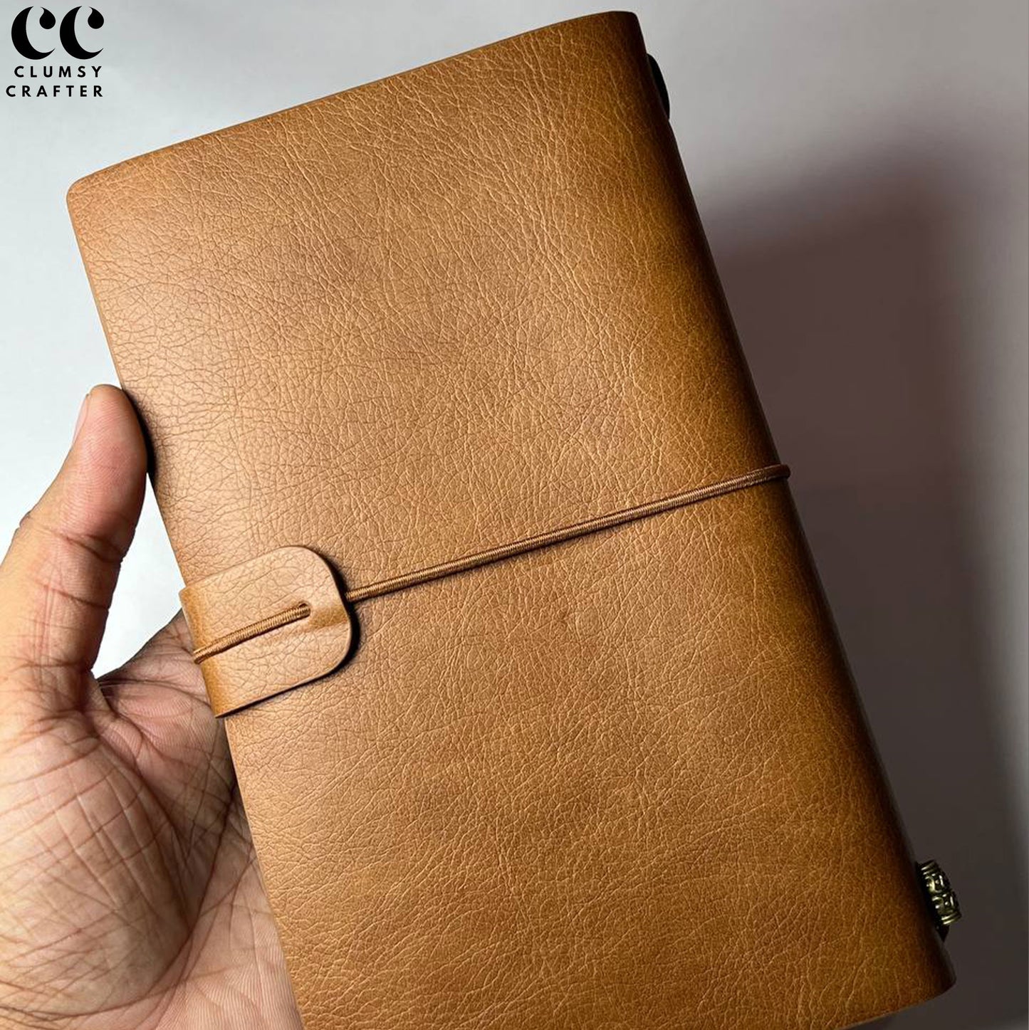 13.3 LEATHER NOTEBOOK- STRAP CLOSURE