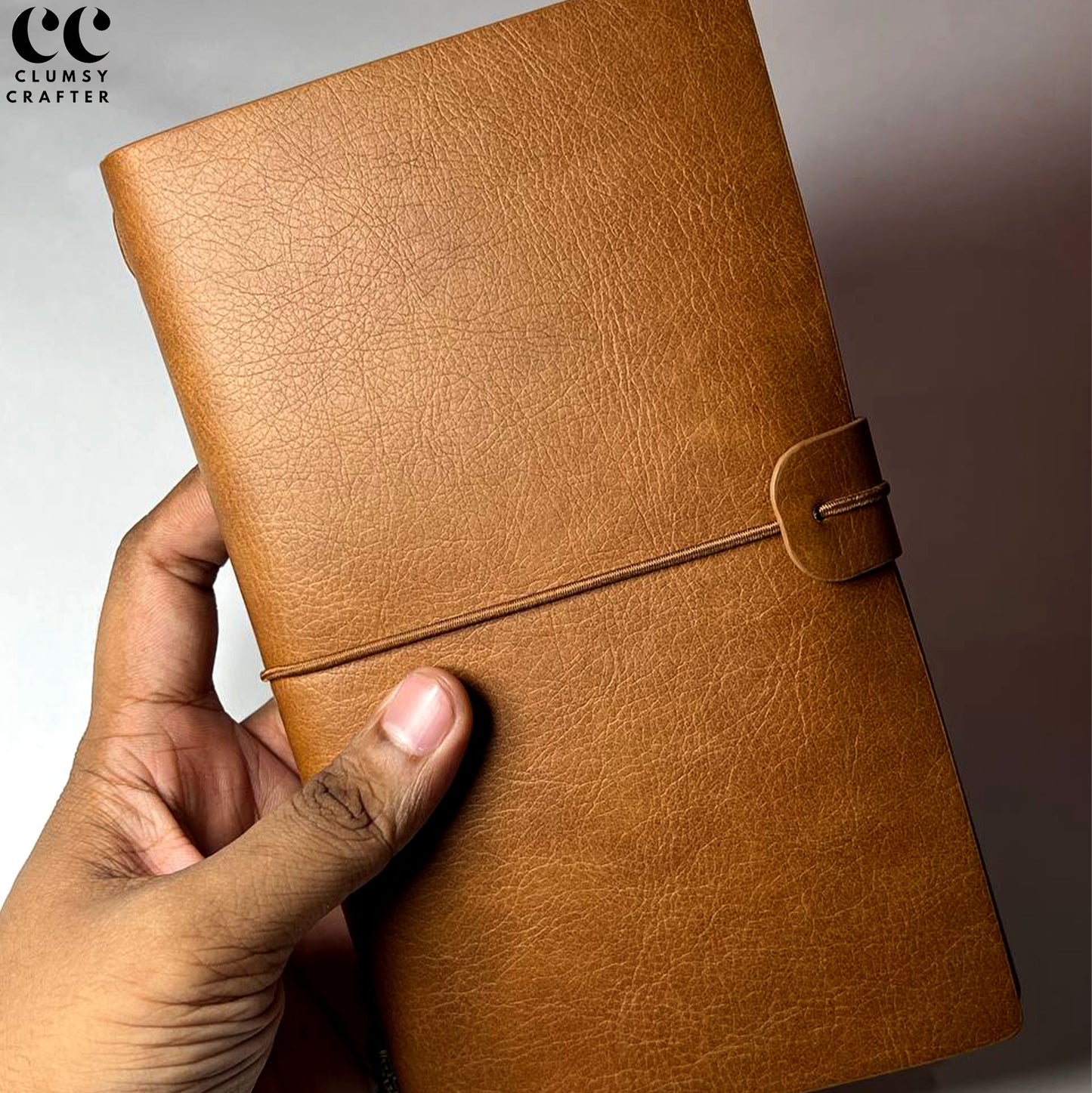 13.3 LEATHER NOTEBOOK- STRAP CLOSURE