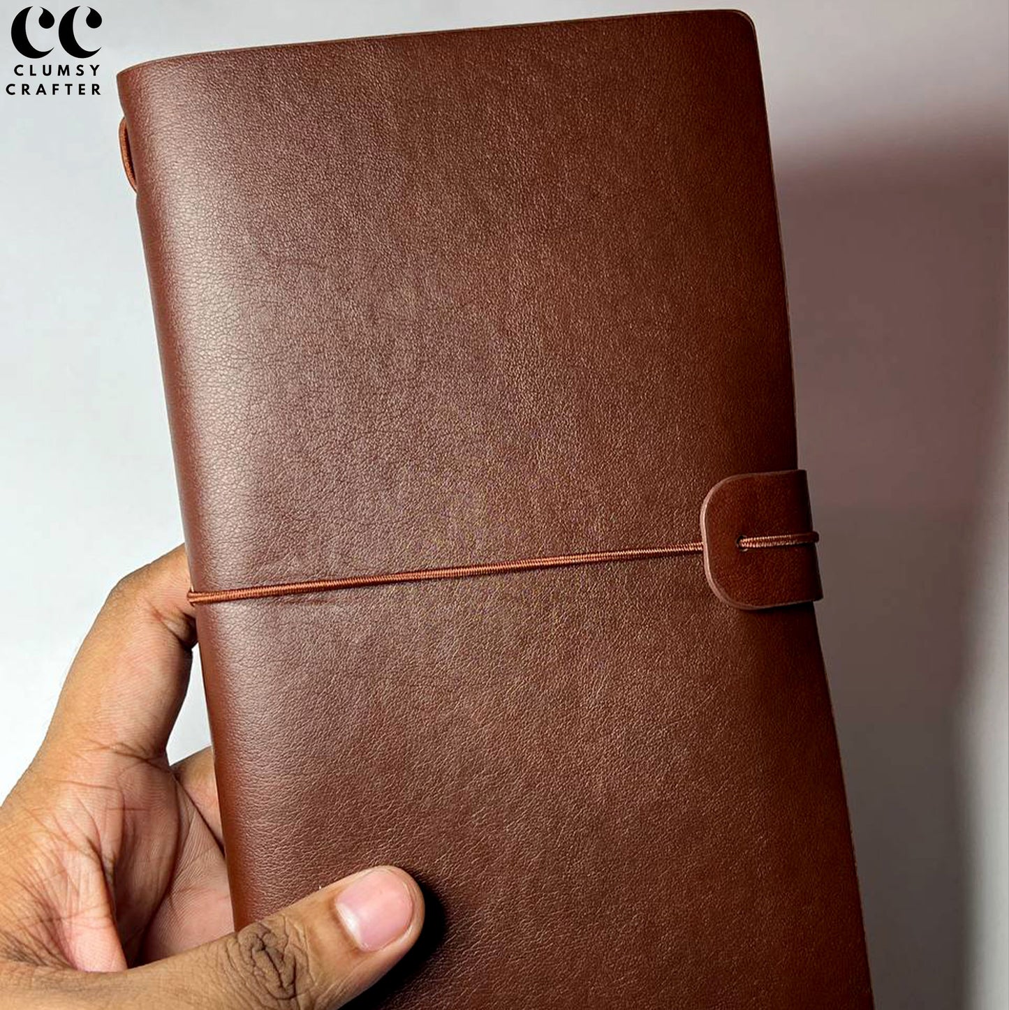 13.3 LEATHER NOTEBOOK- STRAP CLOSURE