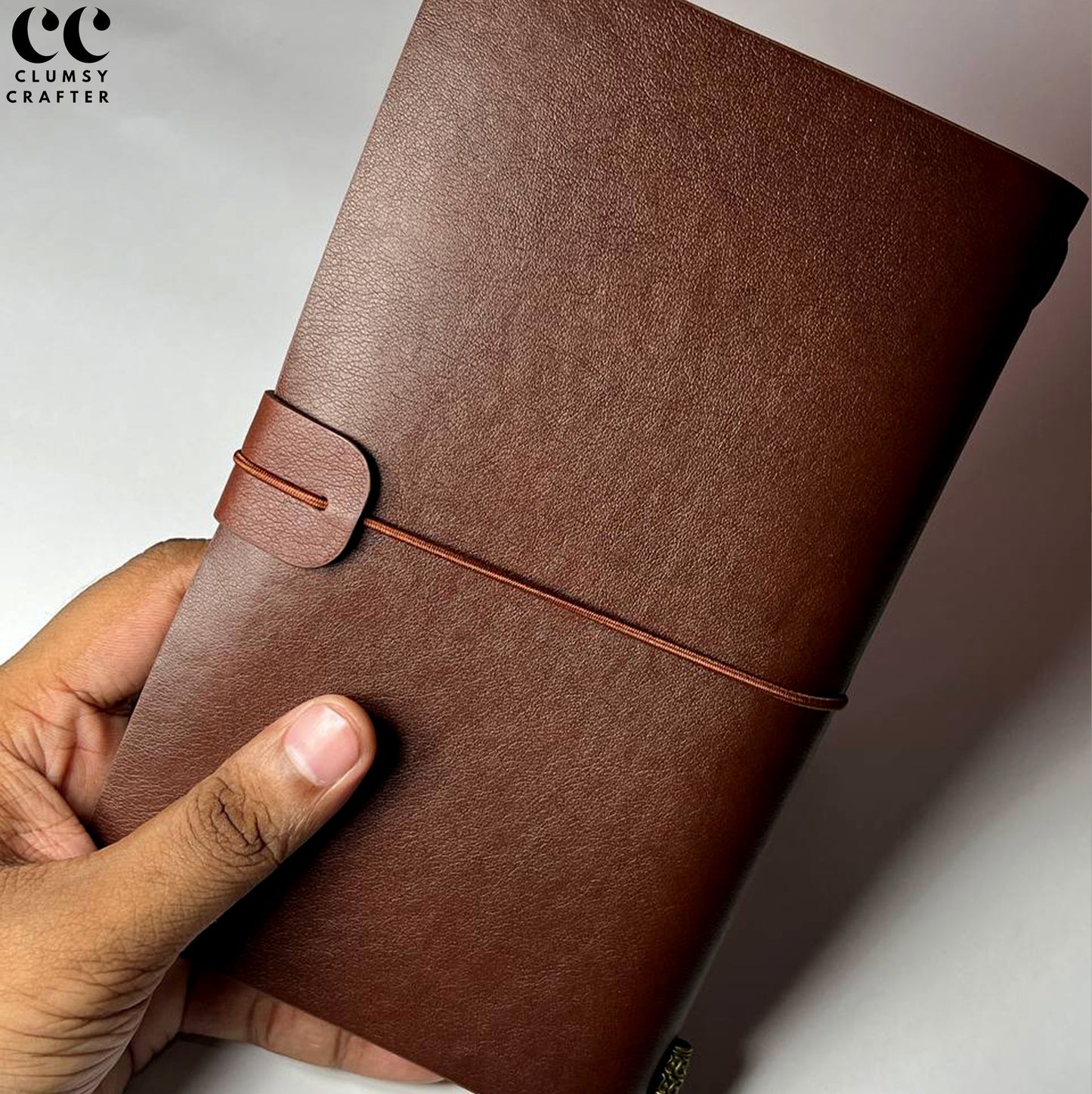 13.3 LEATHER NOTEBOOK- STRAP CLOSURE